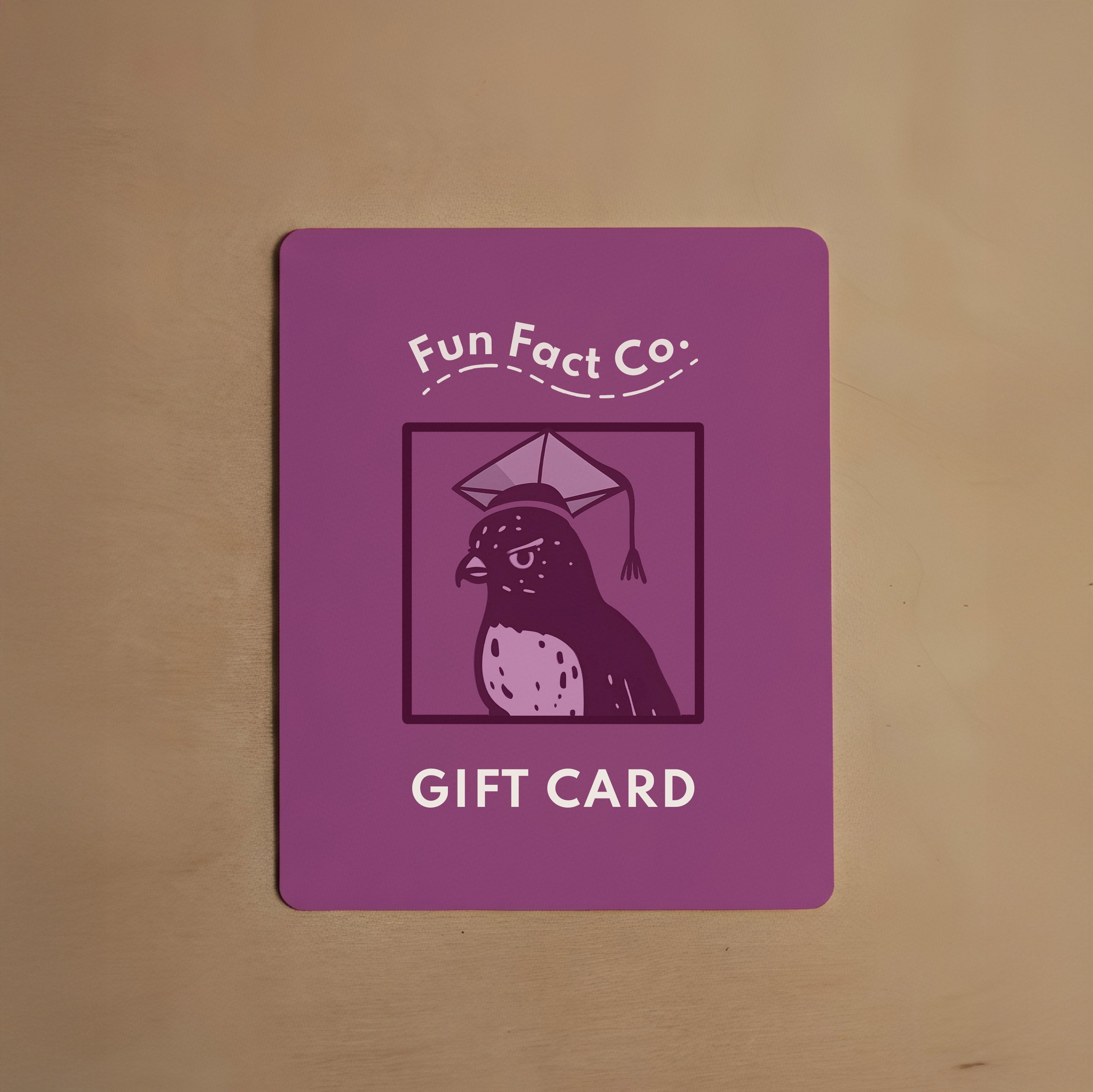 Purple gift card with 'Fun Fact Co.' logo and a cat illustration on a brown background
