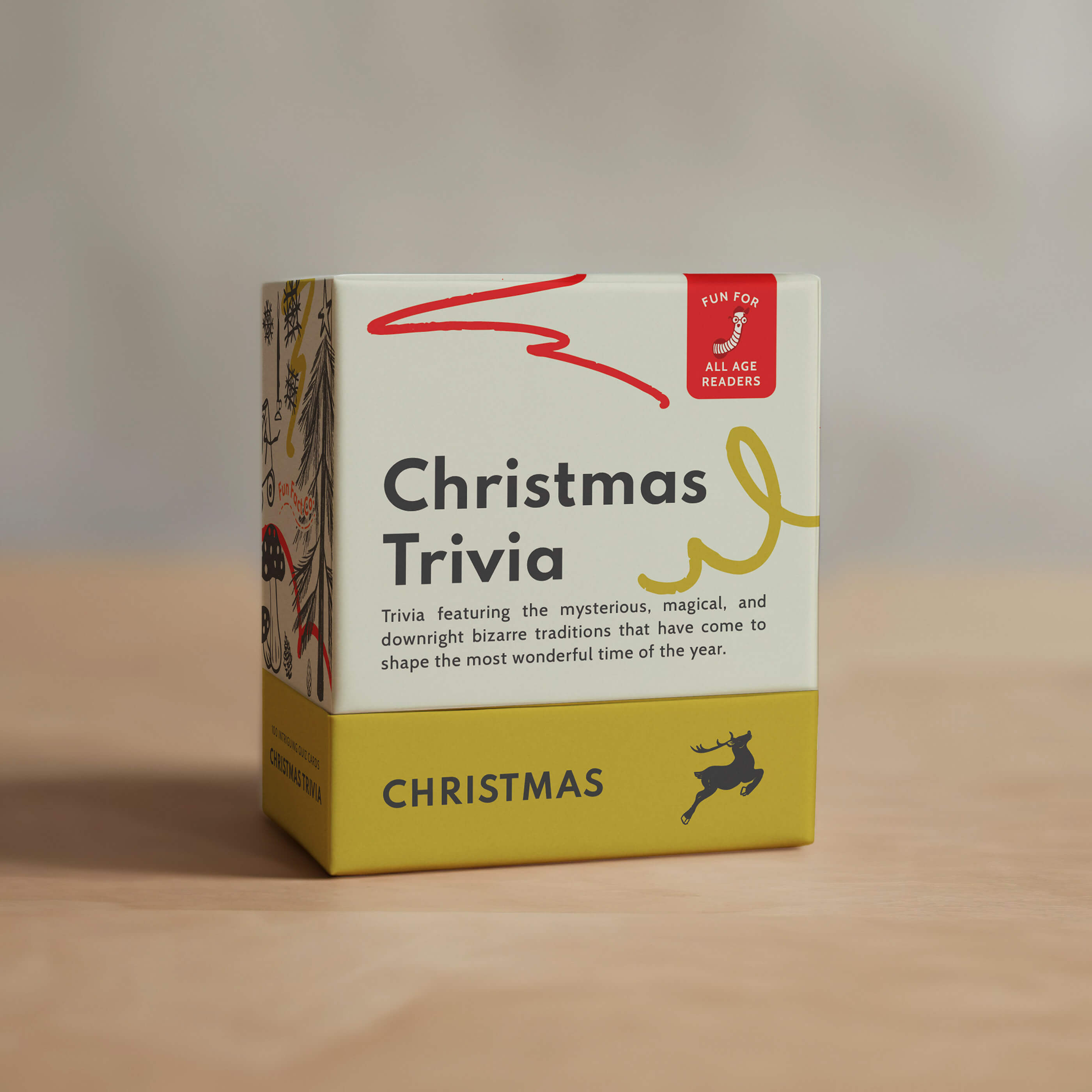 Box of Christmas Trivia game on a wooden surface with a neutral background